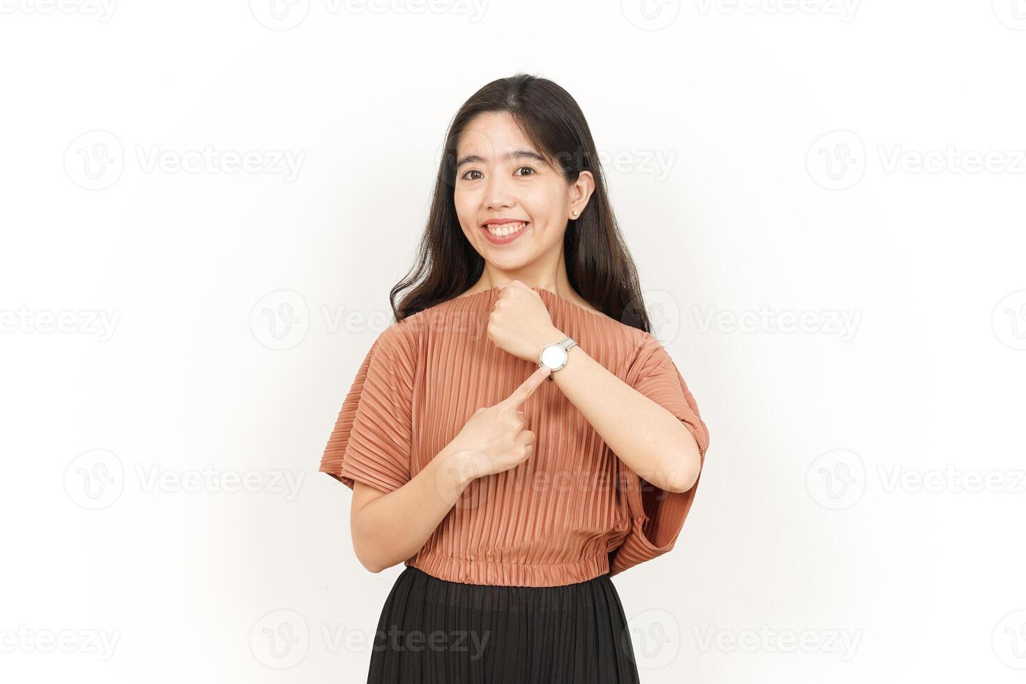 Pointing to Watch and Smile Of Beautiful Asian Woman Isolated On White Background photo