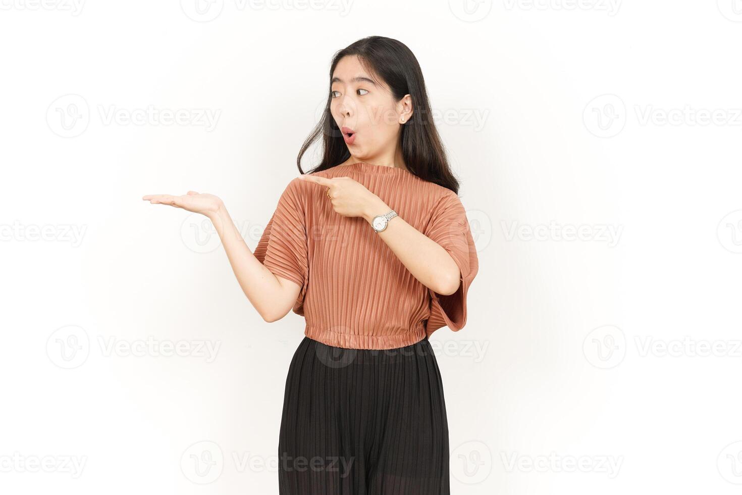 Showing and Presenting Product on Open Palm Of Beautiful Asian Woman Isolated On White Background photo