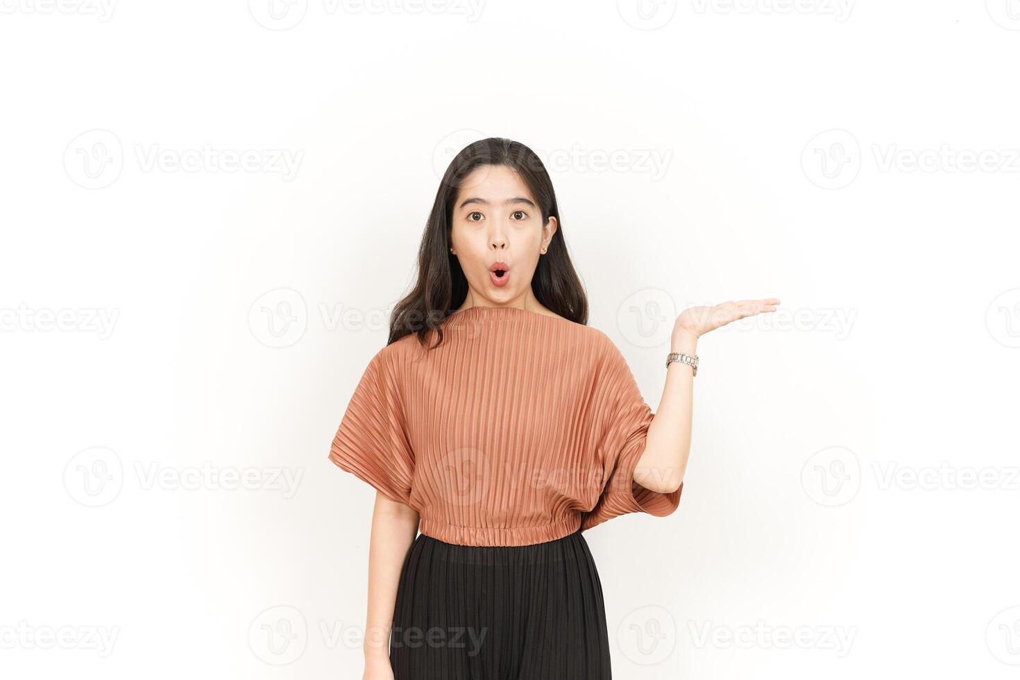 Showing and Presenting Product on Open Palm Of Beautiful Asian Woman Isolated On White Background photo