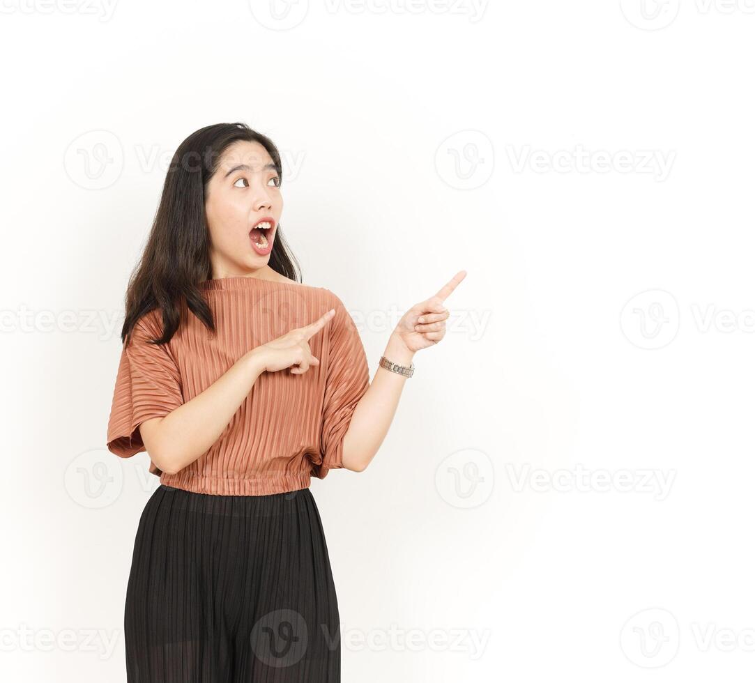 Showing Product and Pointing Side Of Beautiful Asian Woman Isolated On White Background photo