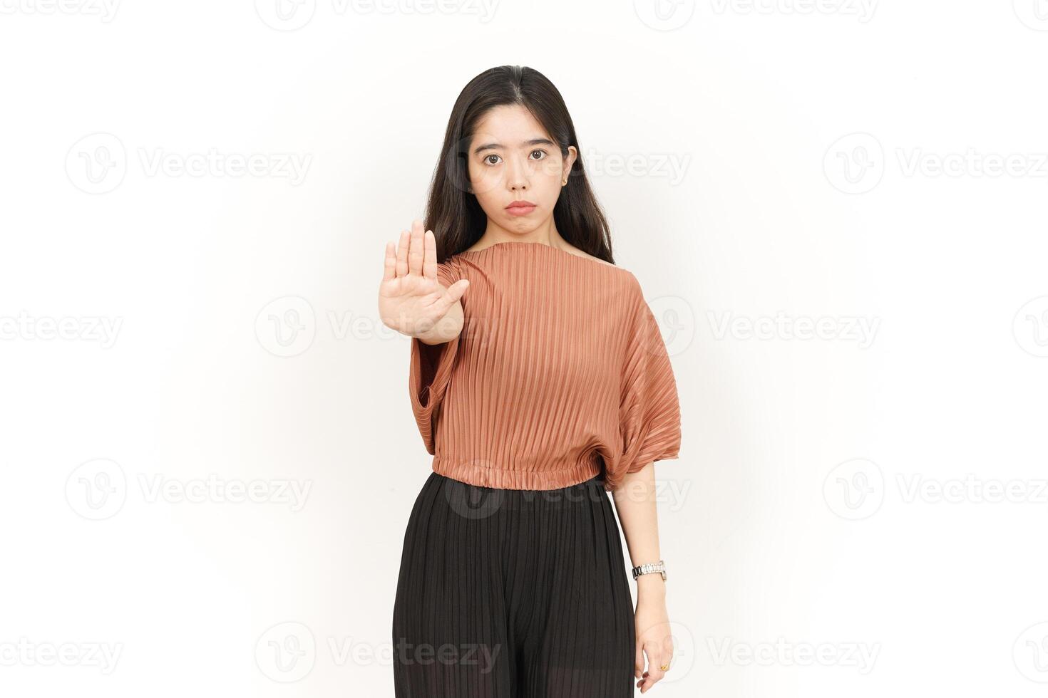 Stop and Rejection Hand Gesture Of Beautiful Asian Woman Isolated On White Background photo