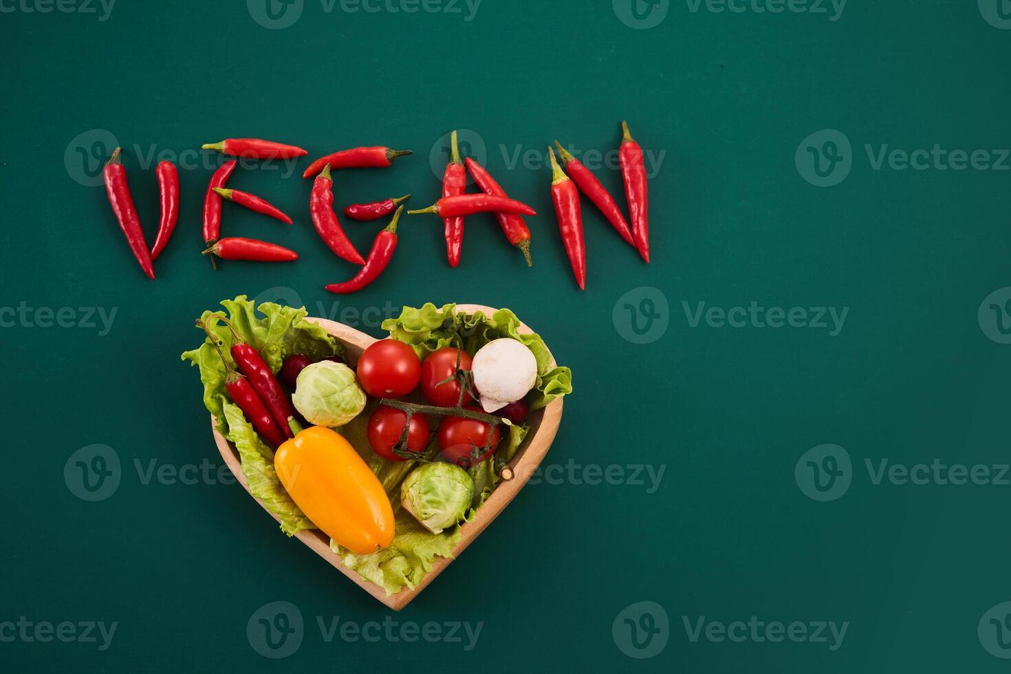 Vegetarian diet month in january called Veganuary. Vegan word made from red chillies photo