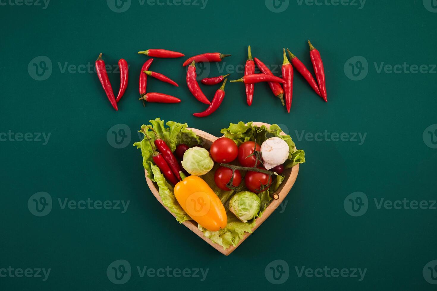 Vegetarian diet month in january called Veganuary. Vegan word made from red chillies photo