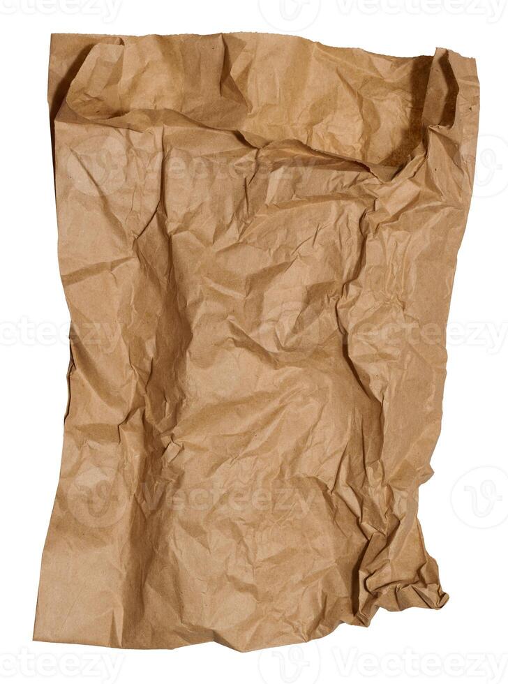 Empty crumpled brown paper bag on isolated background photo
