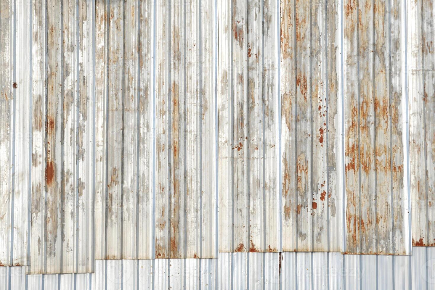 Grunge metal sheet background. Rusty metal texture. Rusty metal background with streaks of rust. Rust stains. photo