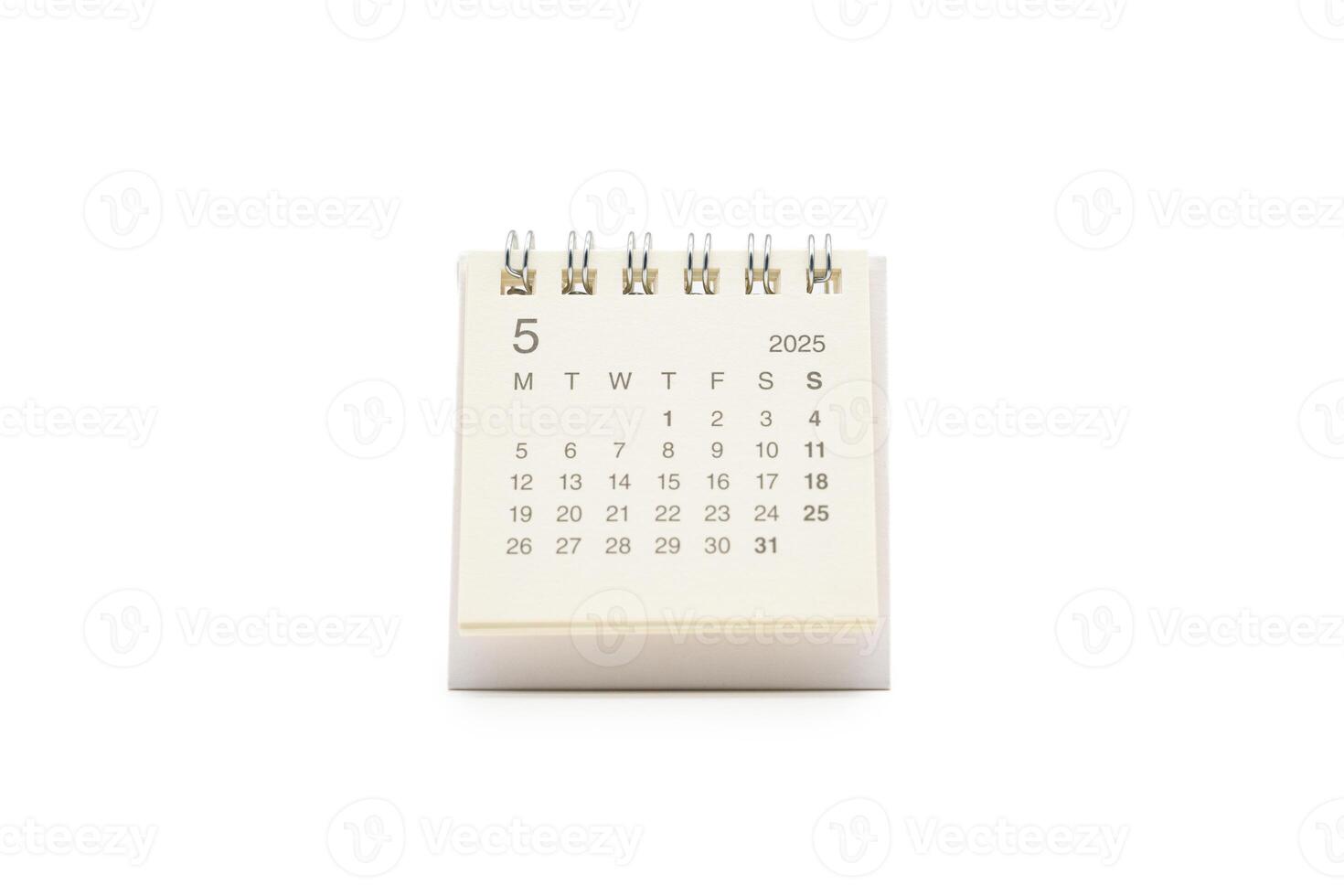 Simple desk calendar for MAY 2025 with office supplies. Calendar concept with copy space. 2025 MAY calendar. photo