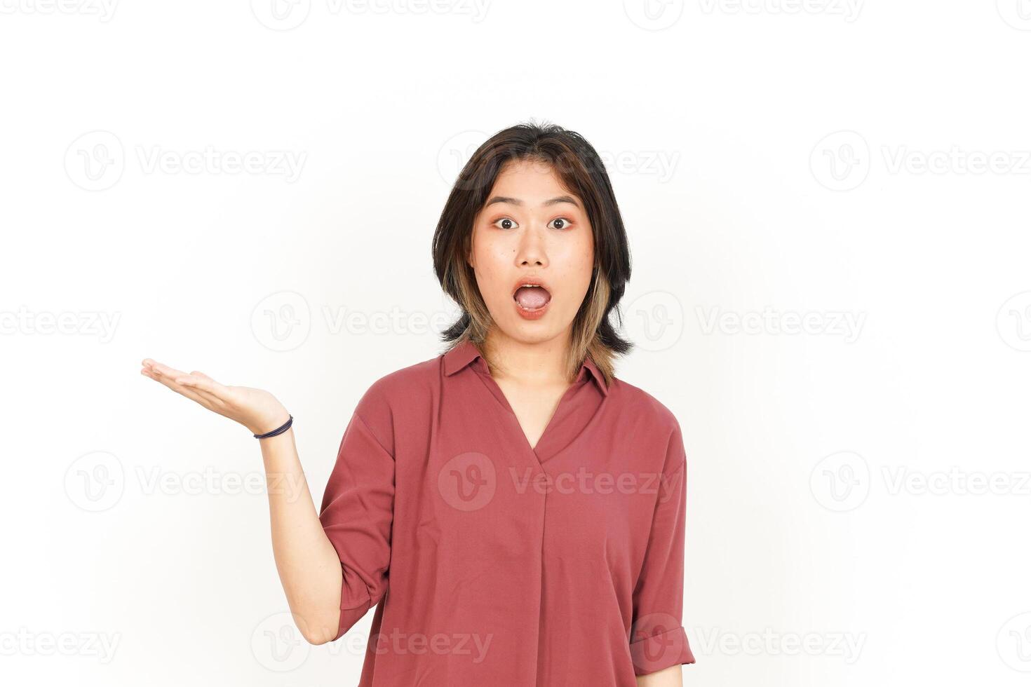 Showing and Presenting Product on Open Palm Of Beautiful Asian Woman Isolated On White Background photo