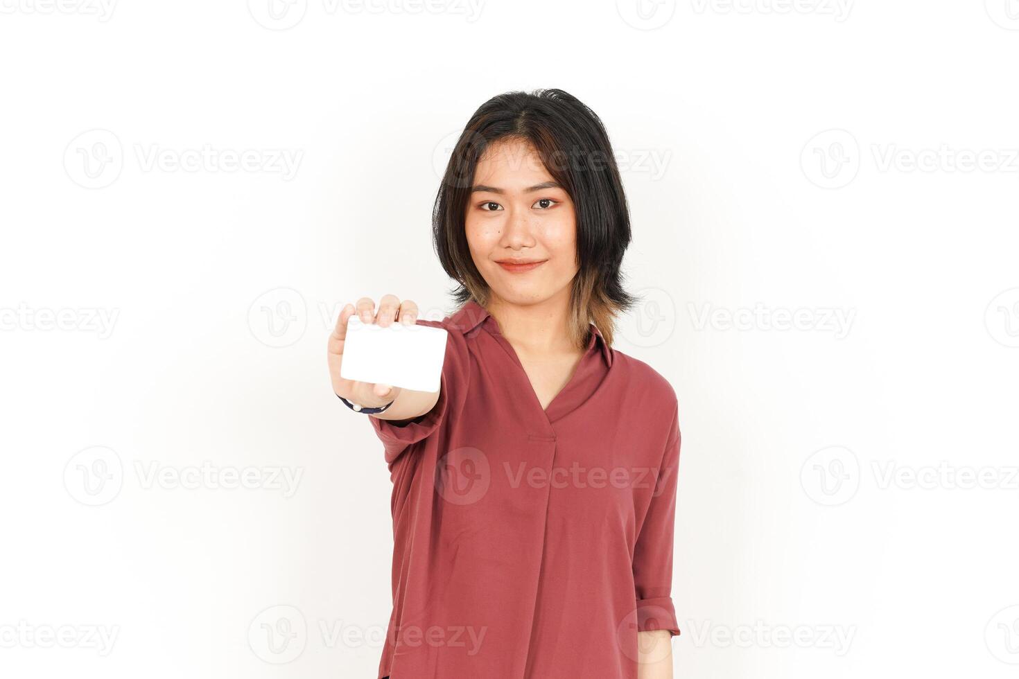 Showing Blank Credit or Bank Card Of Beautiful Asian Woman Isolated On White Background photo