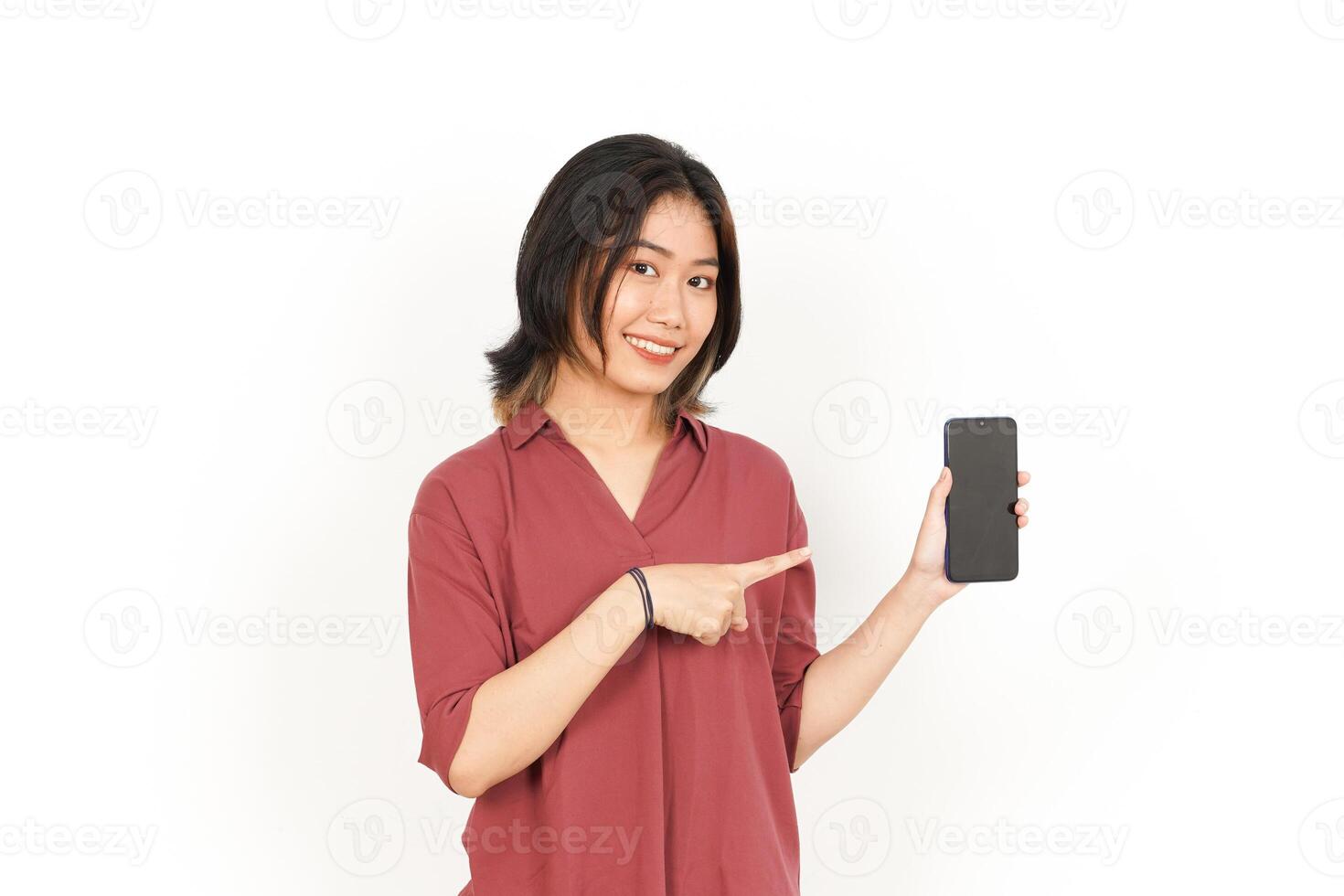 Showing and Presenting Apps or Ads On Blank Screen Smartphone Of Beautiful Asian Woman Isolated On White Background photo
