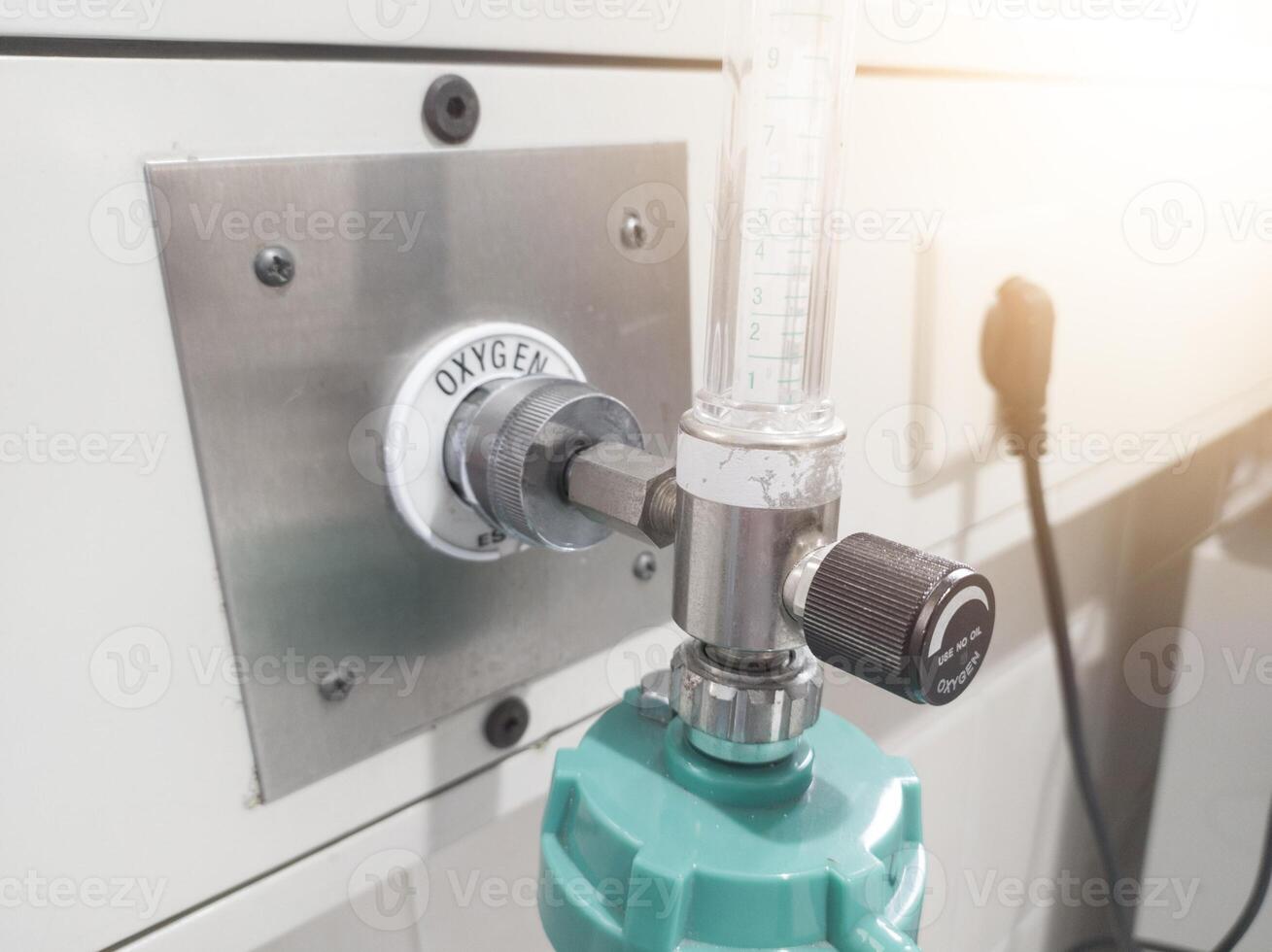 Close up the flowmeter regulator oxygen on the patient room in the hospital. photo