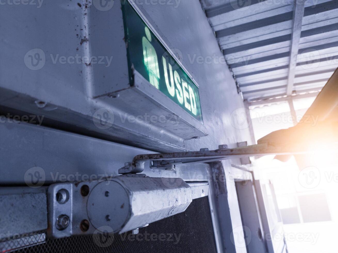 Automation door closed with sign status used on the gate room. photo