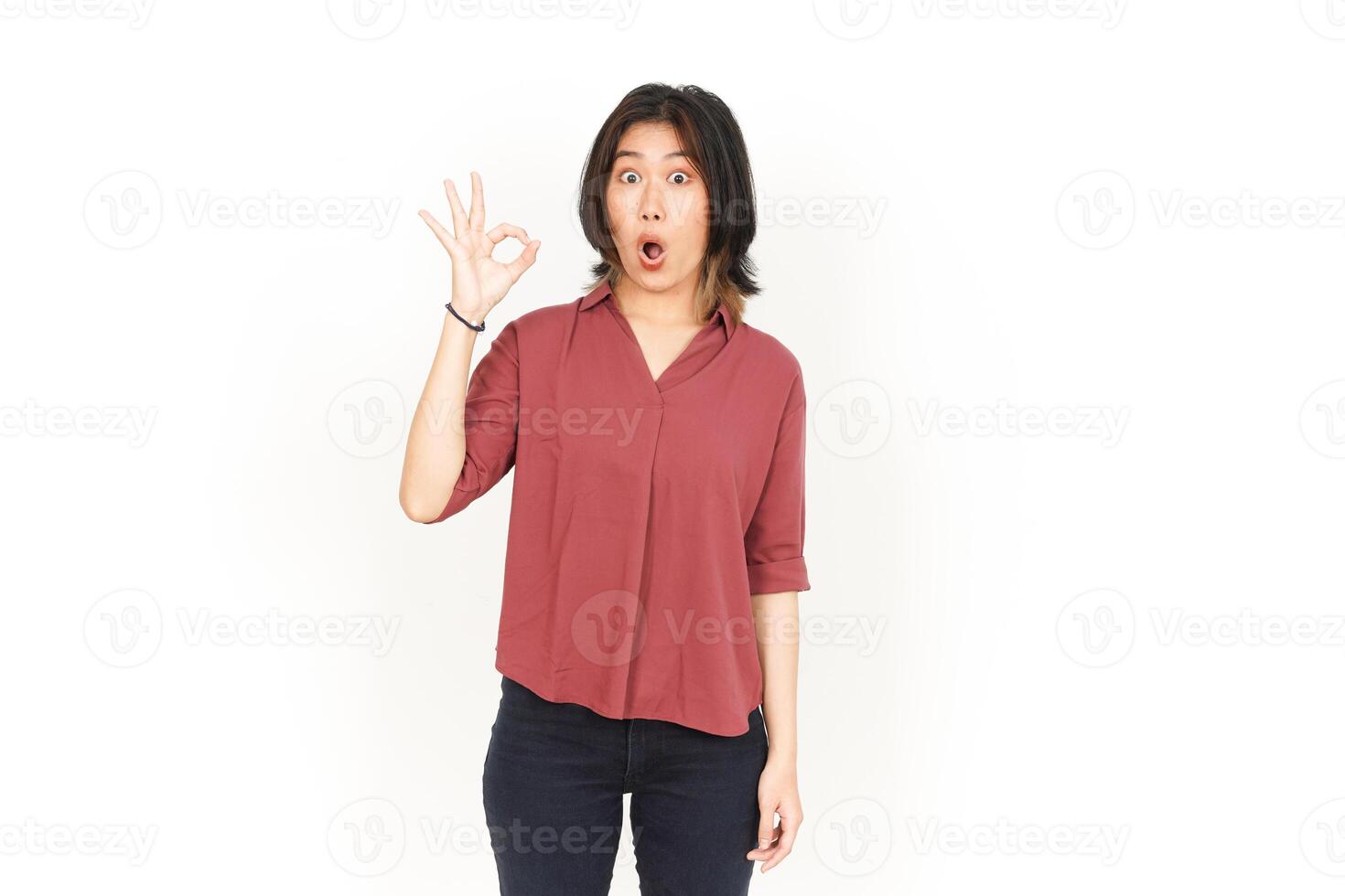 Showing OK sign Of Beautiful Asian Woman Isolated On White Background photo