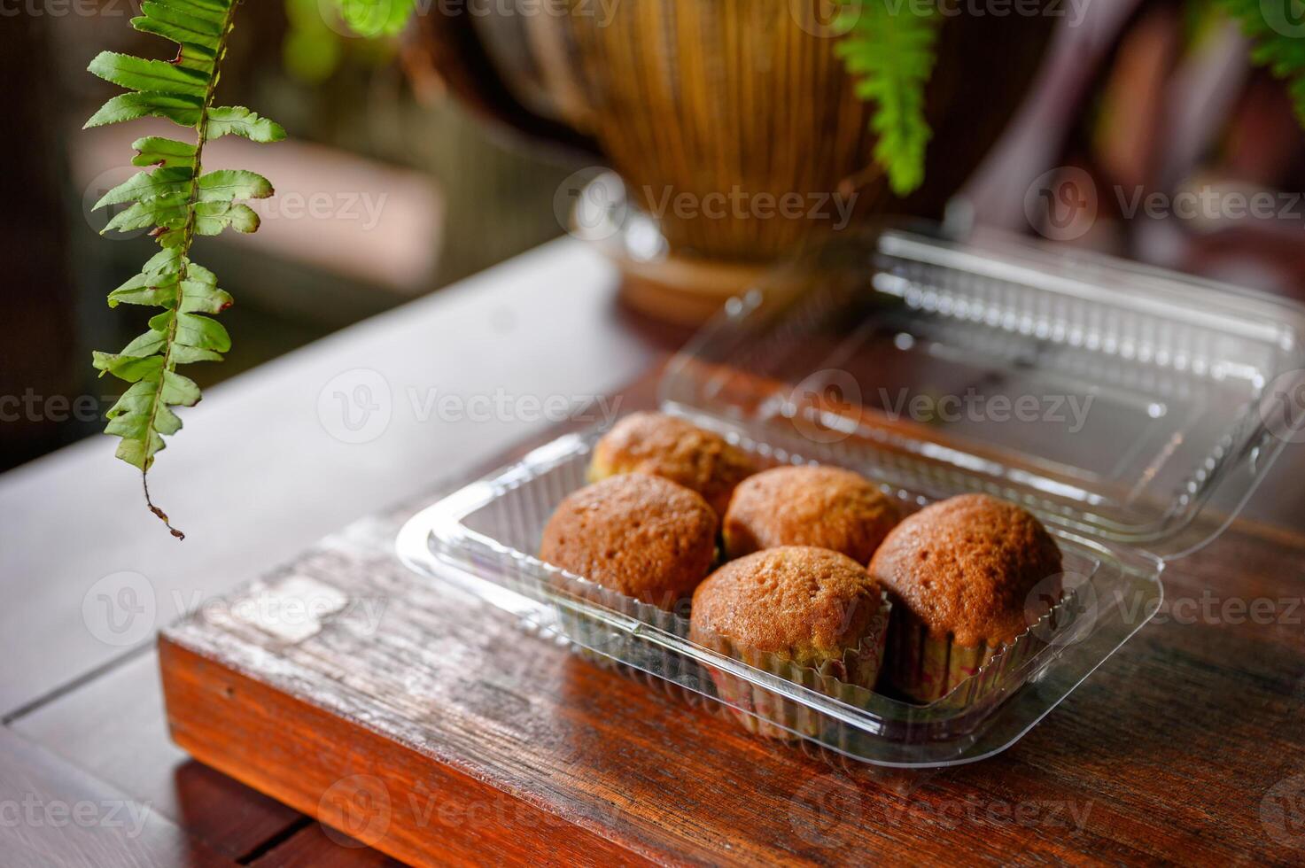 Baked Banana Cake steamed muffin or cupcake on plastic box photo