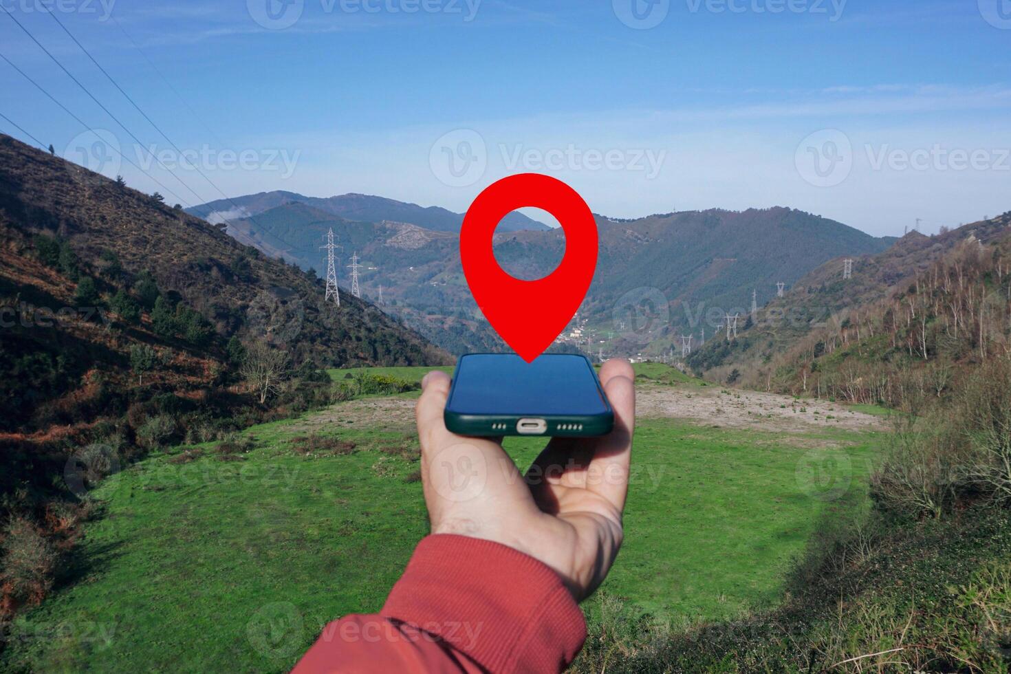hand holding a smart phone searching location, with a gps symbol photo