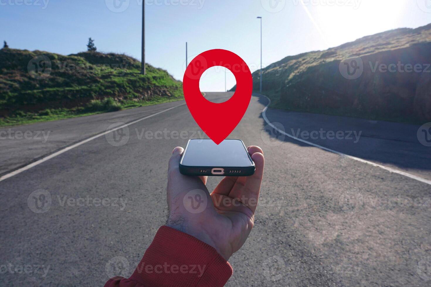 hand holding a smart phone searching location, with a gps symbol photo