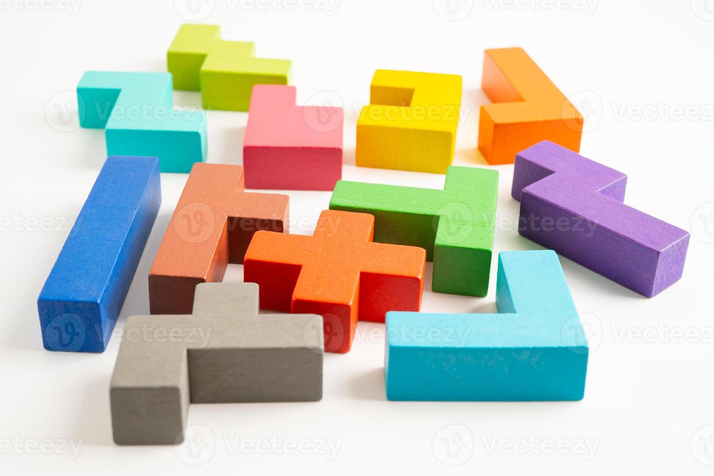 Logical thinking and problem solving creative business solution concept, wooden puzzle geometric shape block shape. photo