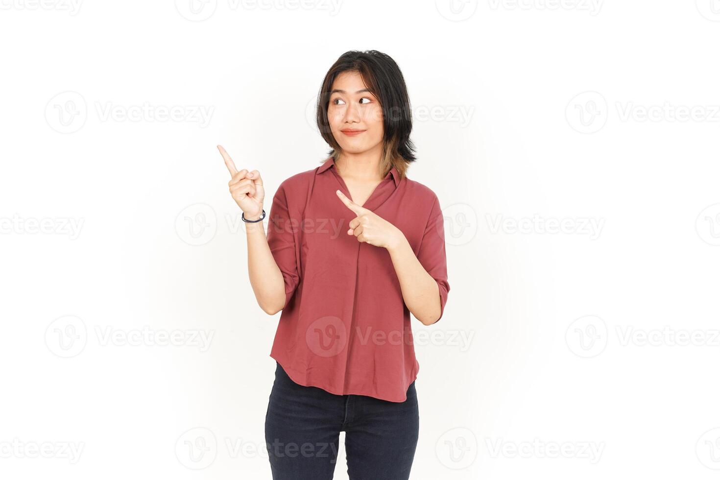 Showing Product and Pointing Side Of Beautiful Asian Woman Isolated On White Background photo