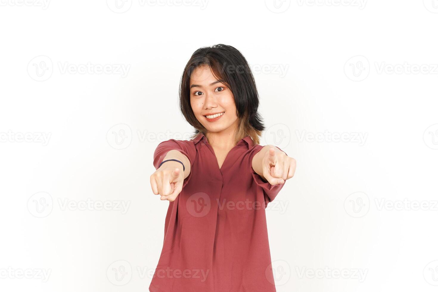 Smiling and Pointing at You, Want You Gesture Of Beautiful Asian Woman Isolated On White Background photo