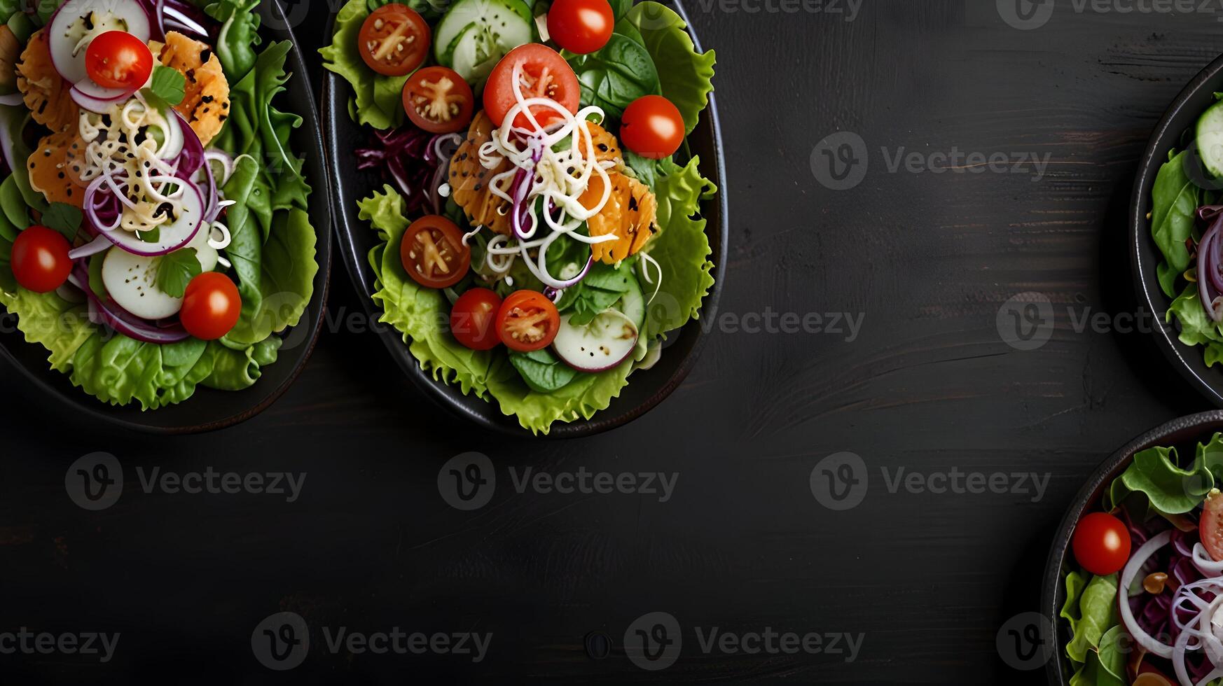 Delicious and Healthy Grilled Chicken Salad with Fresh Vegetables and Dressing in Black Bowls on Dark Wooden Background photo