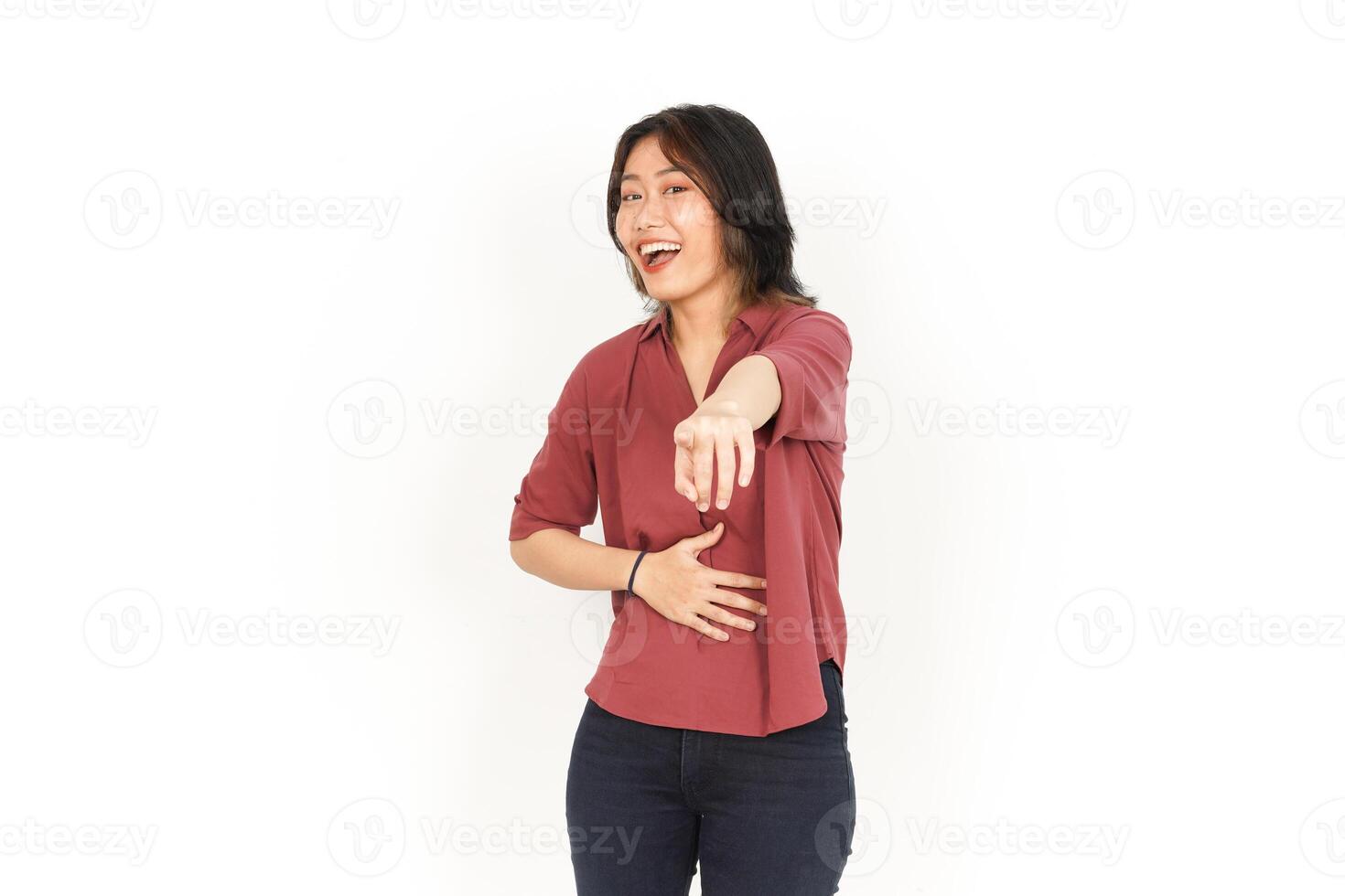Pointing to You and Laughing Of Beautiful Asian Woman Isolated On White Background photo