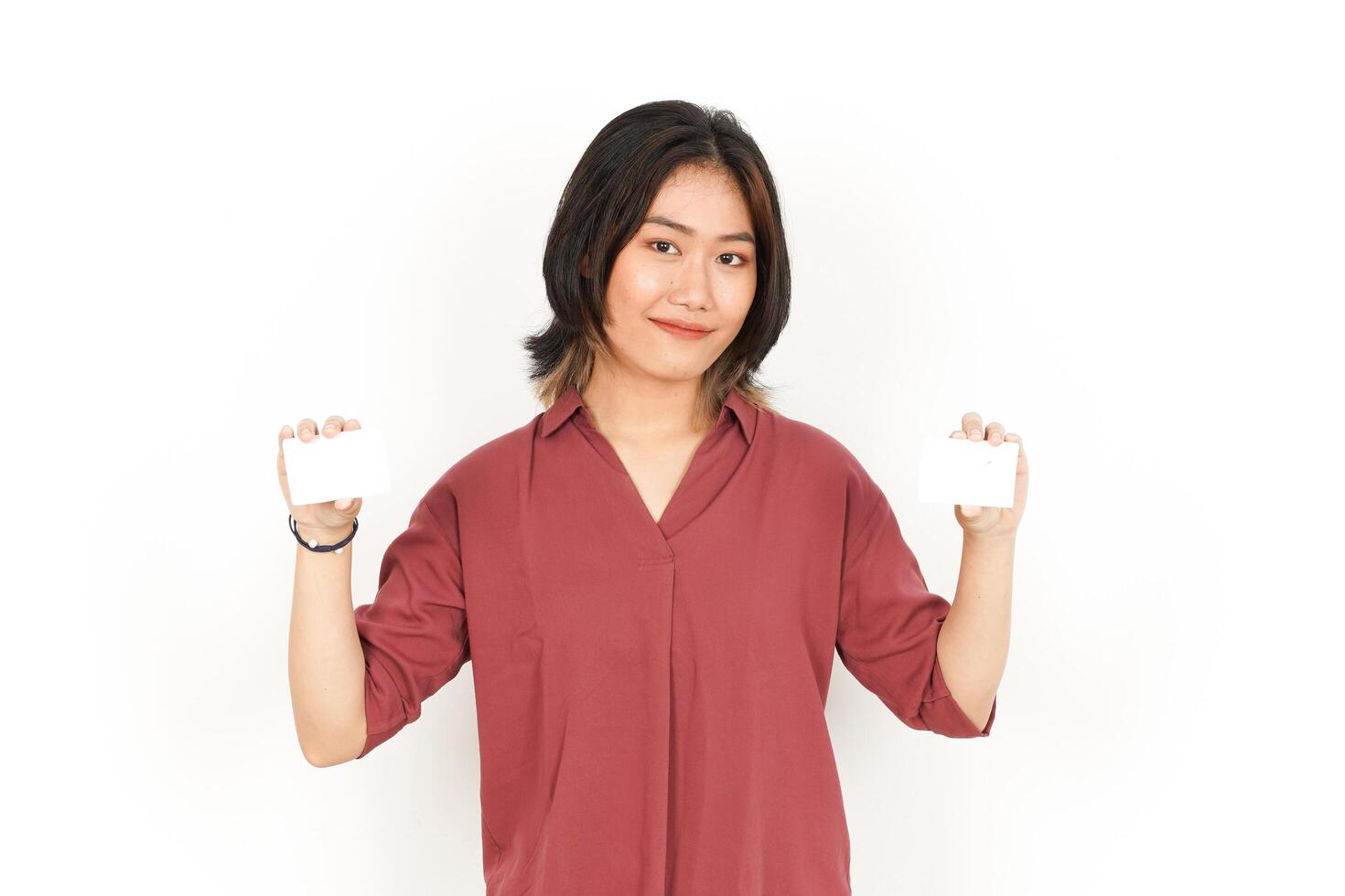 Holding Blank Bank Card Or Credit Card Of Beautiful Asian Woman Isolated On White Background photo