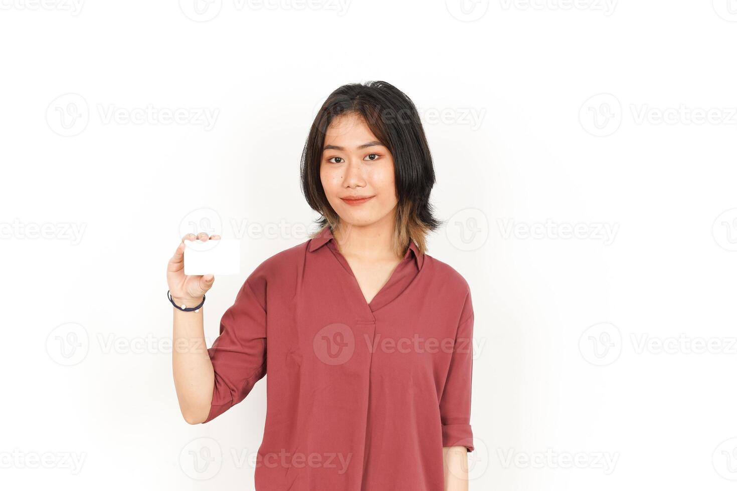 Showing Blank Credit or Bank Card Of Beautiful Asian Woman Isolated On White Background photo