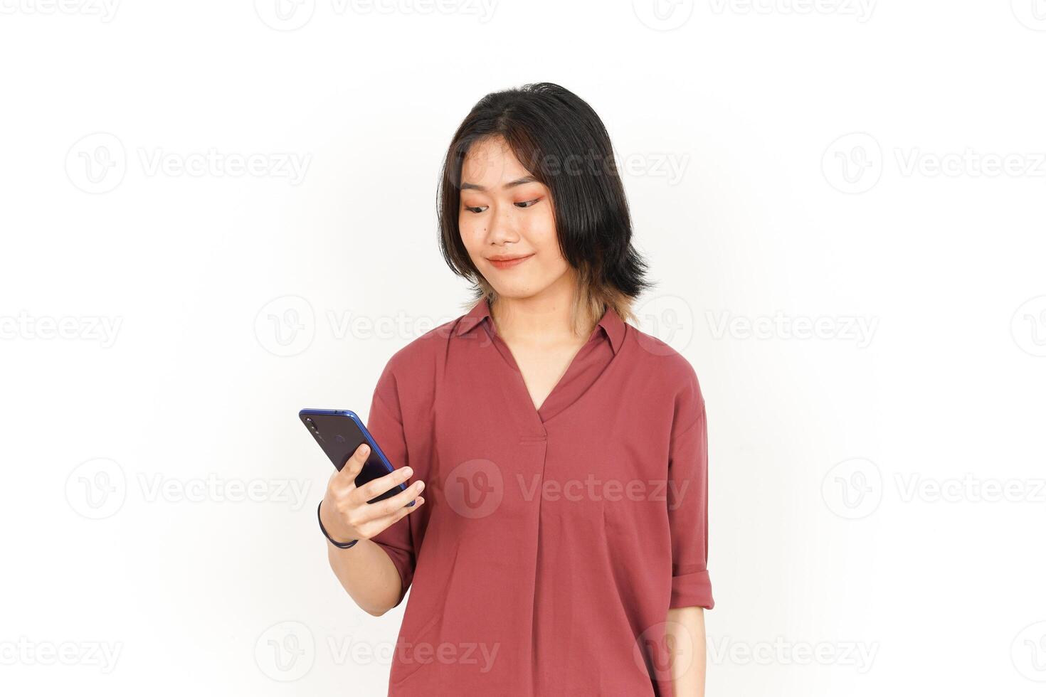 Holding and Using Smartphone Of Beautiful Asian Woman Isolated On White Background photo