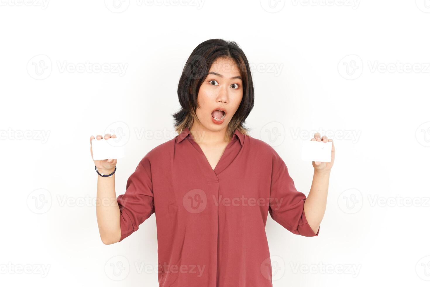 Showing Blank Credit or Bank Card Of Beautiful Asian Woman Isolated On White Background photo