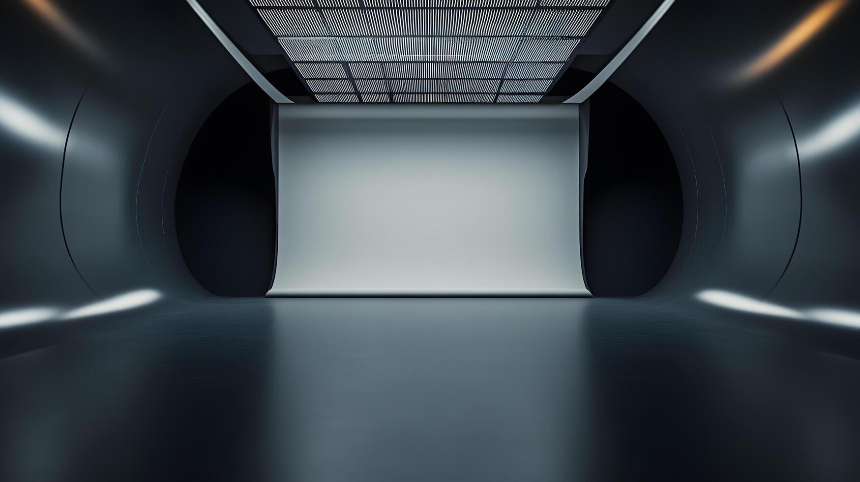 A large empty room with a white wall and a black floor photo