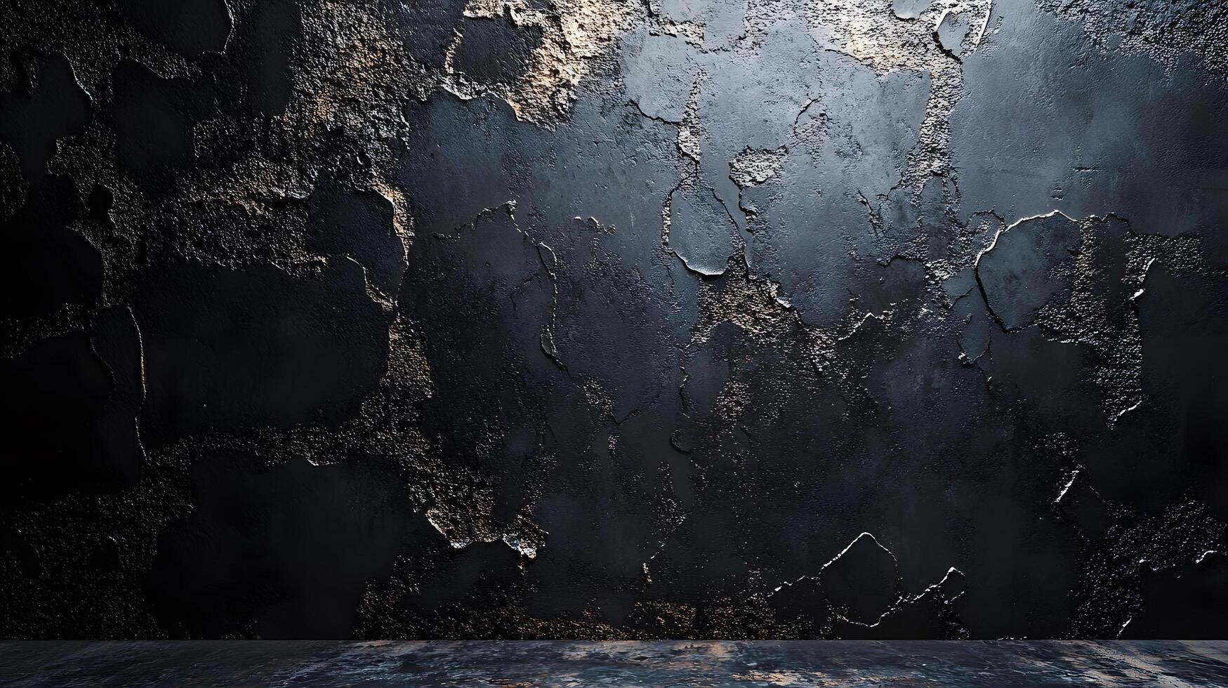 A wall with a black background and a few spots of gold photo