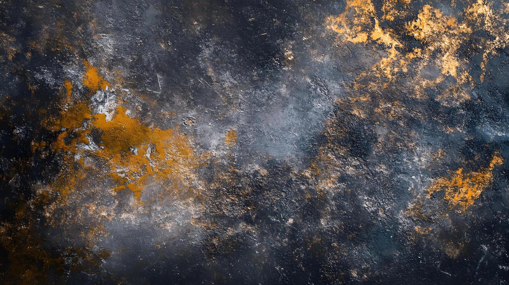 A black and orange background with a lot of white and gray specks photo