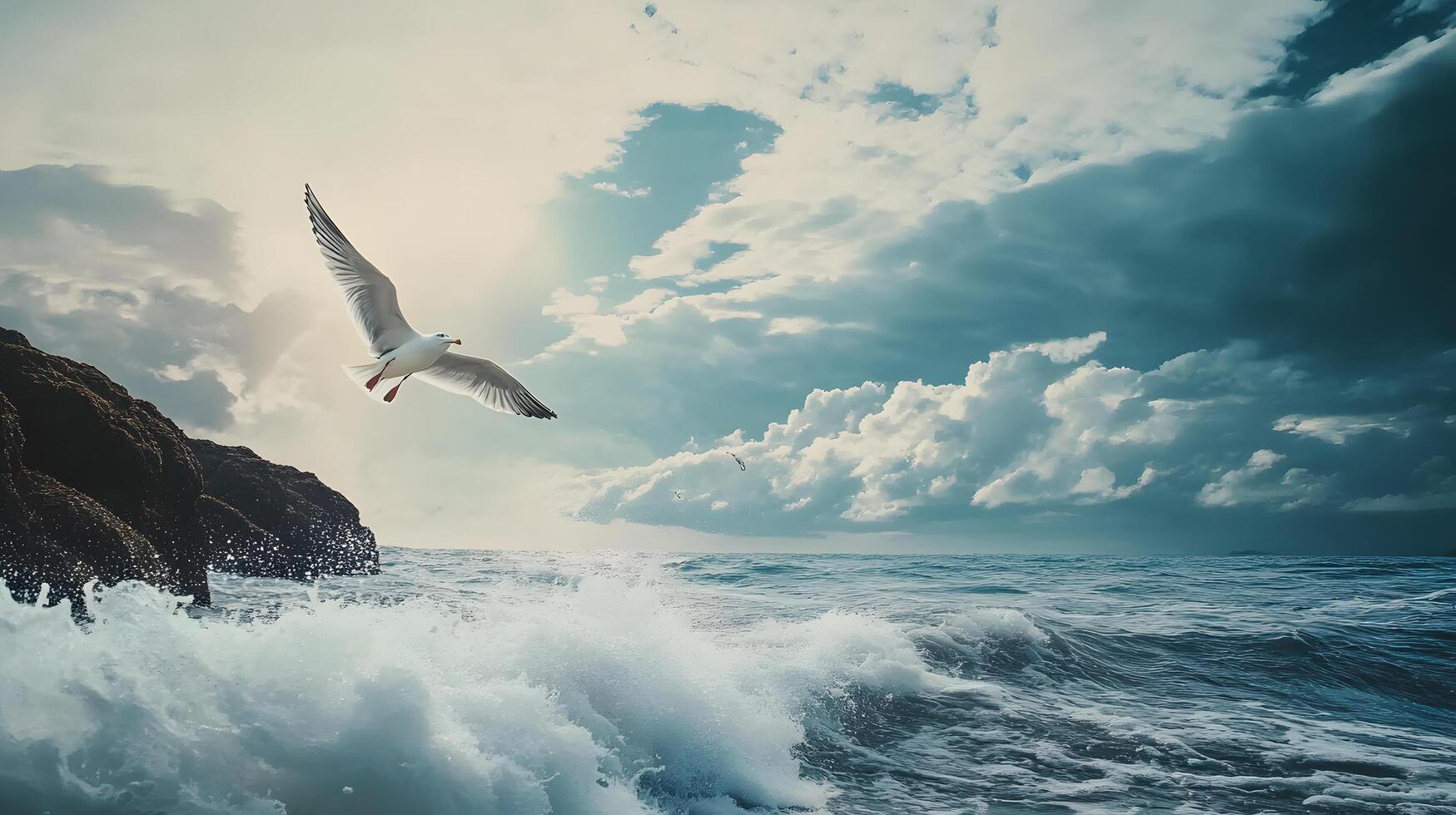 A seagull flies over the ocean, with the waves crashing below photo