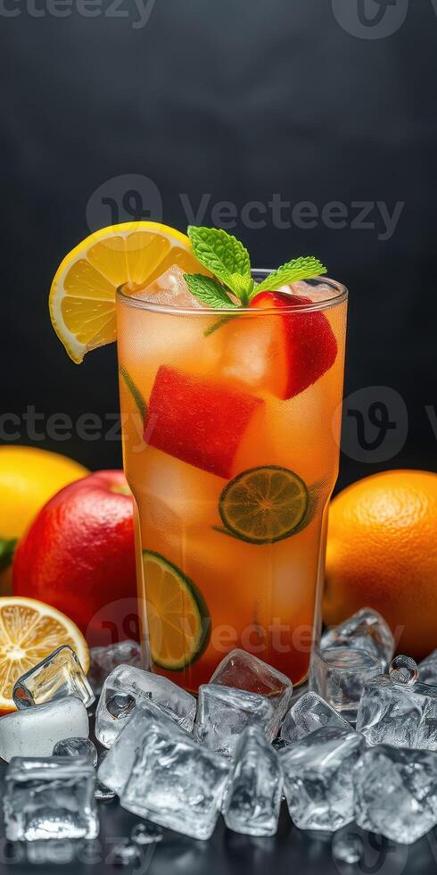 Refreshing fruit cocktail with citrus and berries served on ice photo