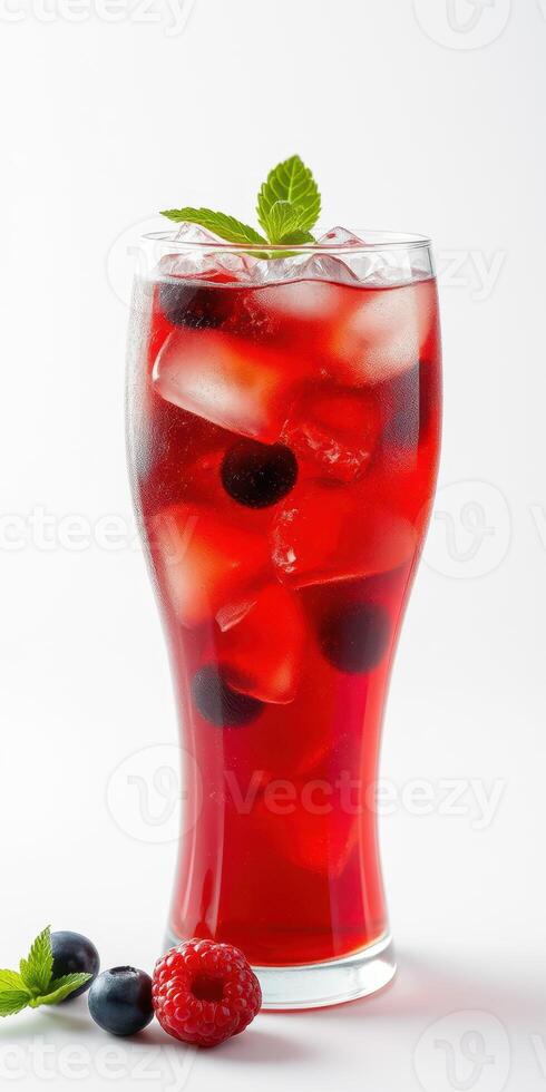 Refreshing berry drink served in a tall glass with ice and mint garnish perfect for warm days photo
