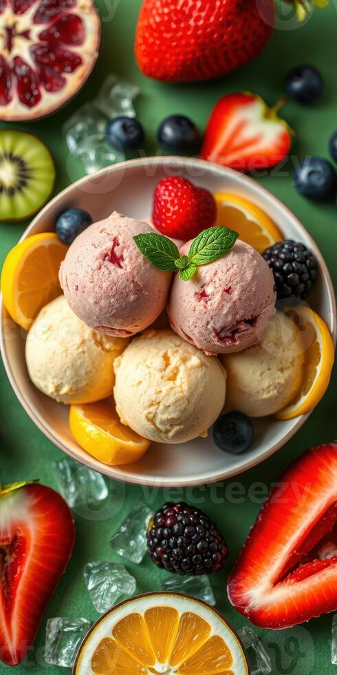 Delicious assortment of ice cream scoops surrounded by fresh fruits on a vibrant green background photo