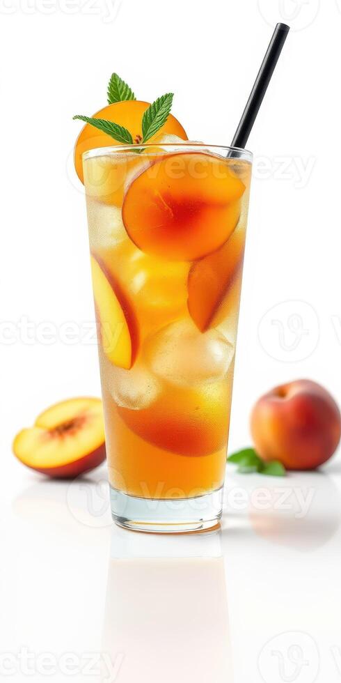 Refreshing peach iced tea served in a tall glass with fresh peach slices and mint leaves photo
