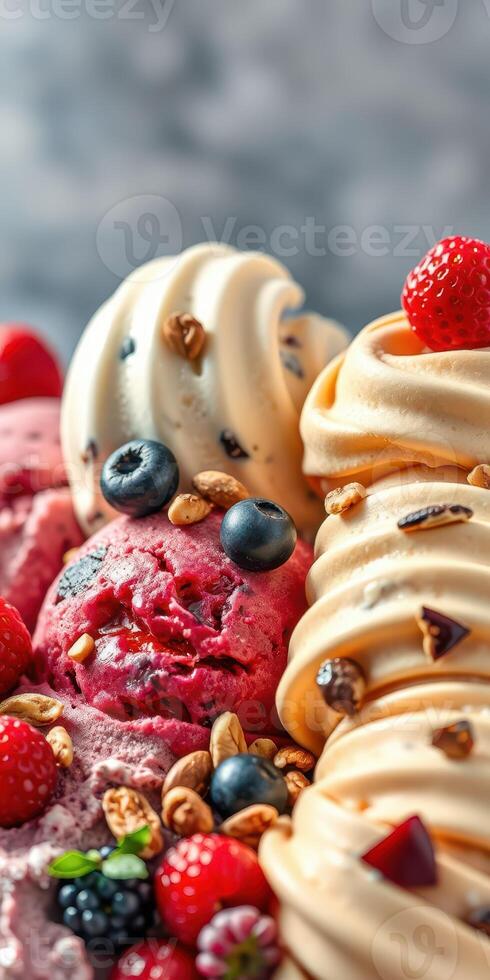 Delicious assortment of colorful ice cream scoops garnished with fresh berries and crunchy toppings photo