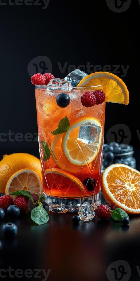 Refreshing summer cocktail with fresh fruit and mint against a dark background photo