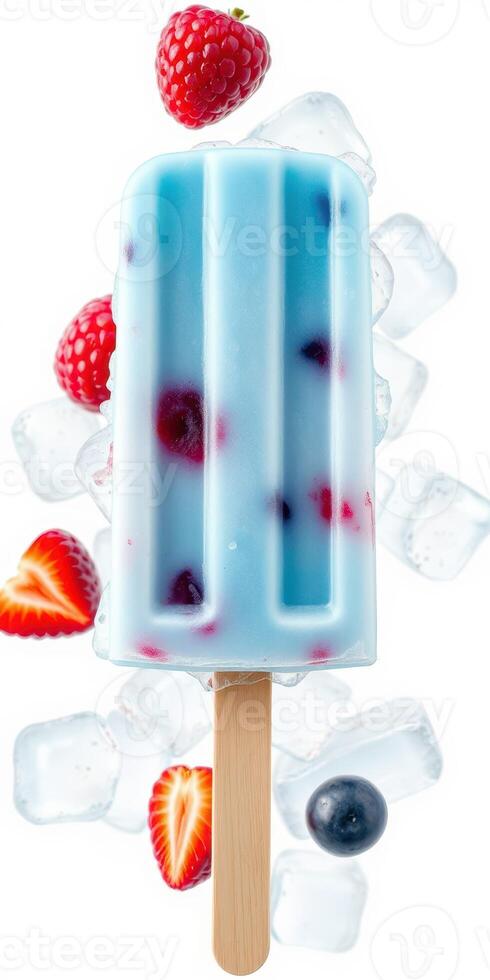Colorful frozen popsicle with mixed berries and ice cubes on a bright background photo