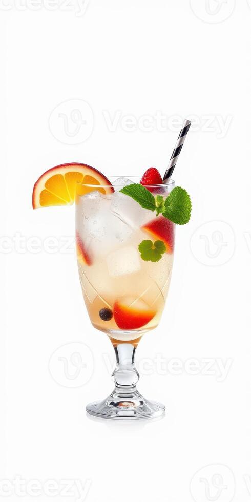 Refreshing fruit cocktail served in a decorative glass with citrus and mint garnishes photo