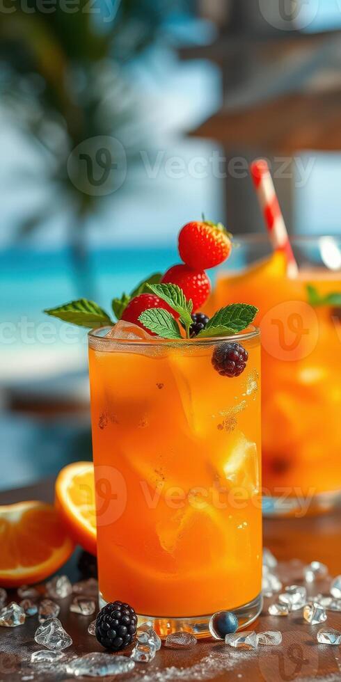 Refreshing tropical cocktails with fruits on a sunny beach setting photo