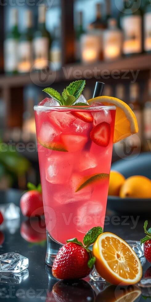 Refreshing summer cocktail with strawberries and citrus garnishes served at a vibrant bar setting photo