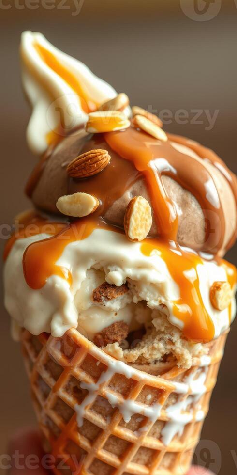 Enjoying a delicious ice cream cone topped with caramel and almonds at a dessert shop photo