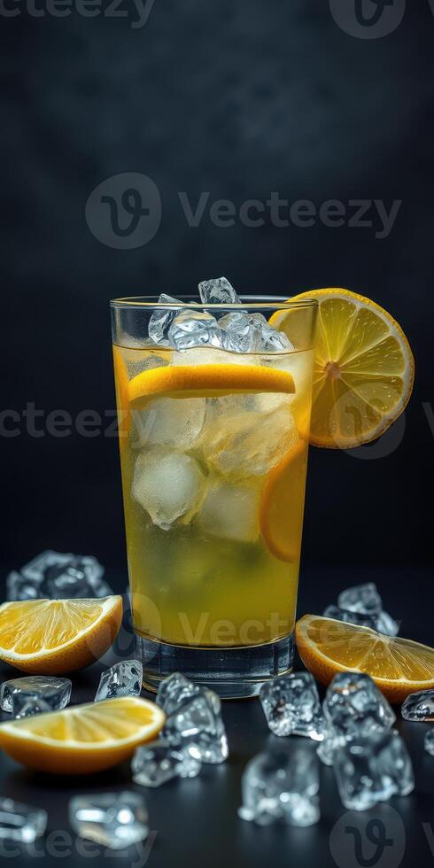 Refreshing lemonade with ice and lemon slices surrounded by fresh orange segments photo