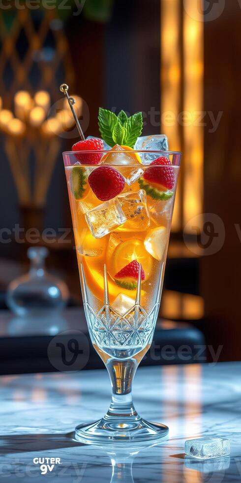 Refreshing cocktail garnished with mint and raspberries served in elegant glass at a cozy bar during evening hours photo