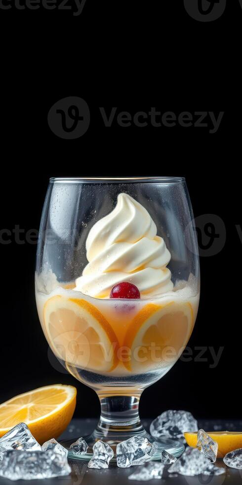 Refreshing dessert treat featuring creamy soft serve and fresh lemon slices served in a stylish glass bowl photo