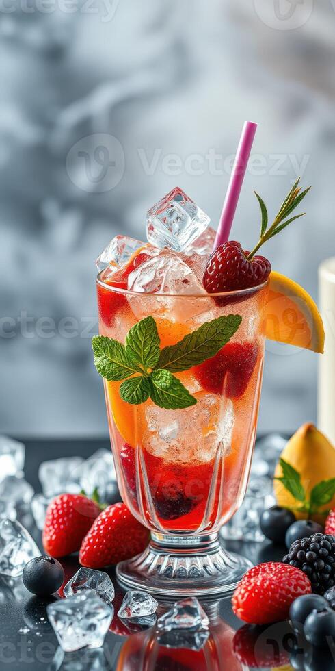 Refreshing mixed berry cocktail served with mint and citrus on a summer afternoon photo
