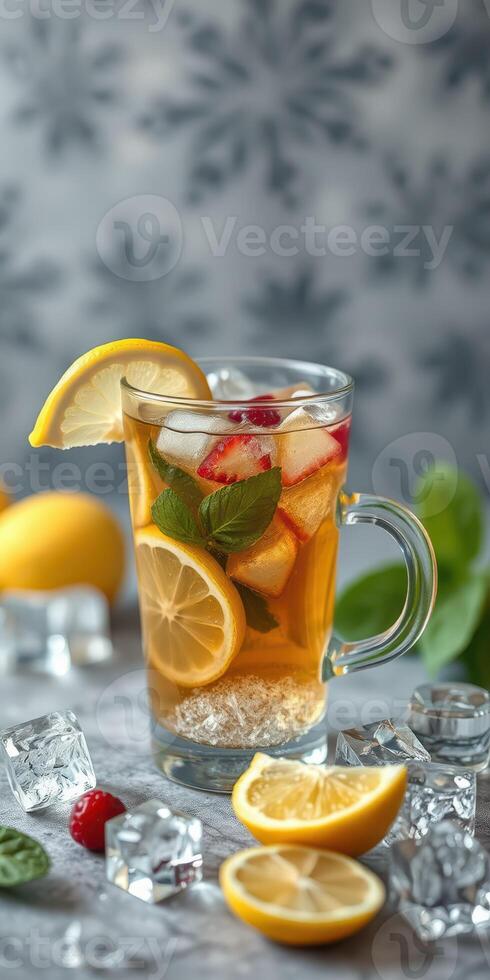 Refreshing summer drink with lemon, mint, and berries on a stylish table setting photo