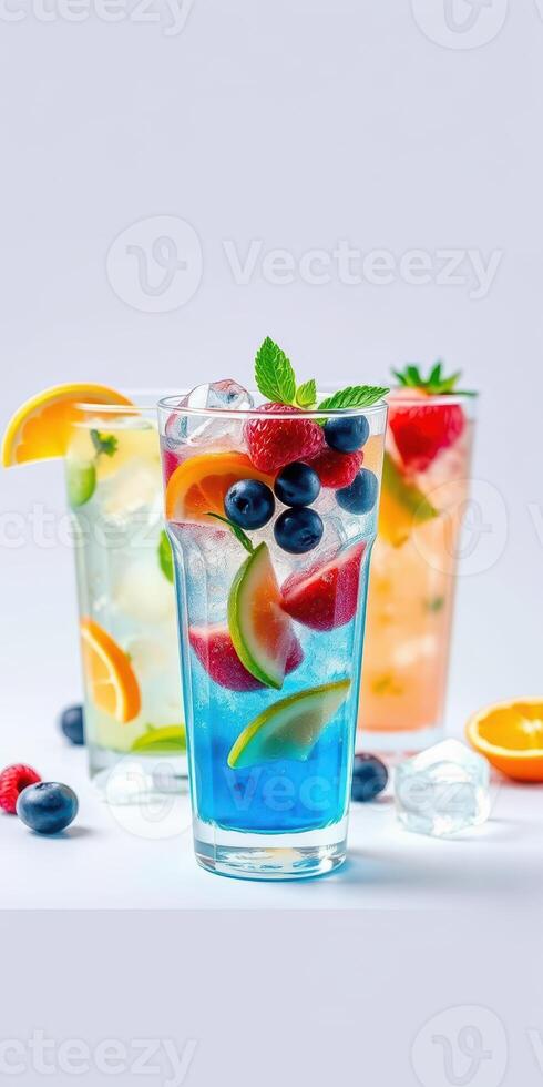 Refreshing summer cocktails with vibrant fruits and ice in a colorful display on a light background photo