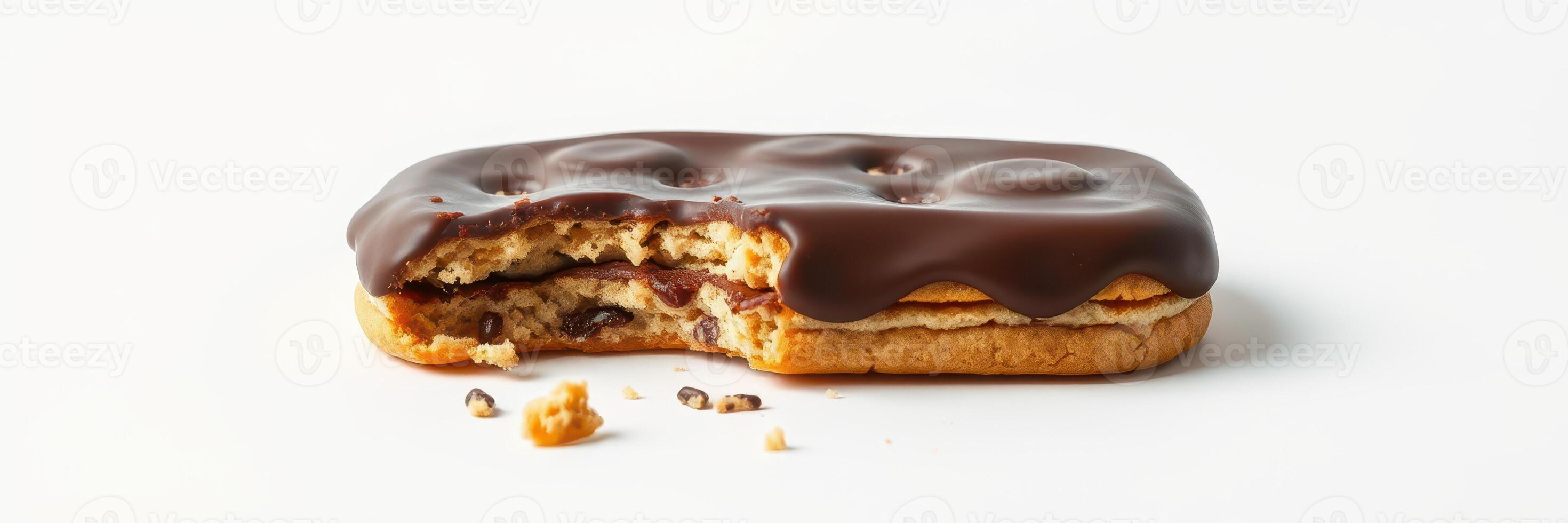 Delicious chocolate-covered cookie with a bite taken out, showcasing its creamy filling and crispy texture photo